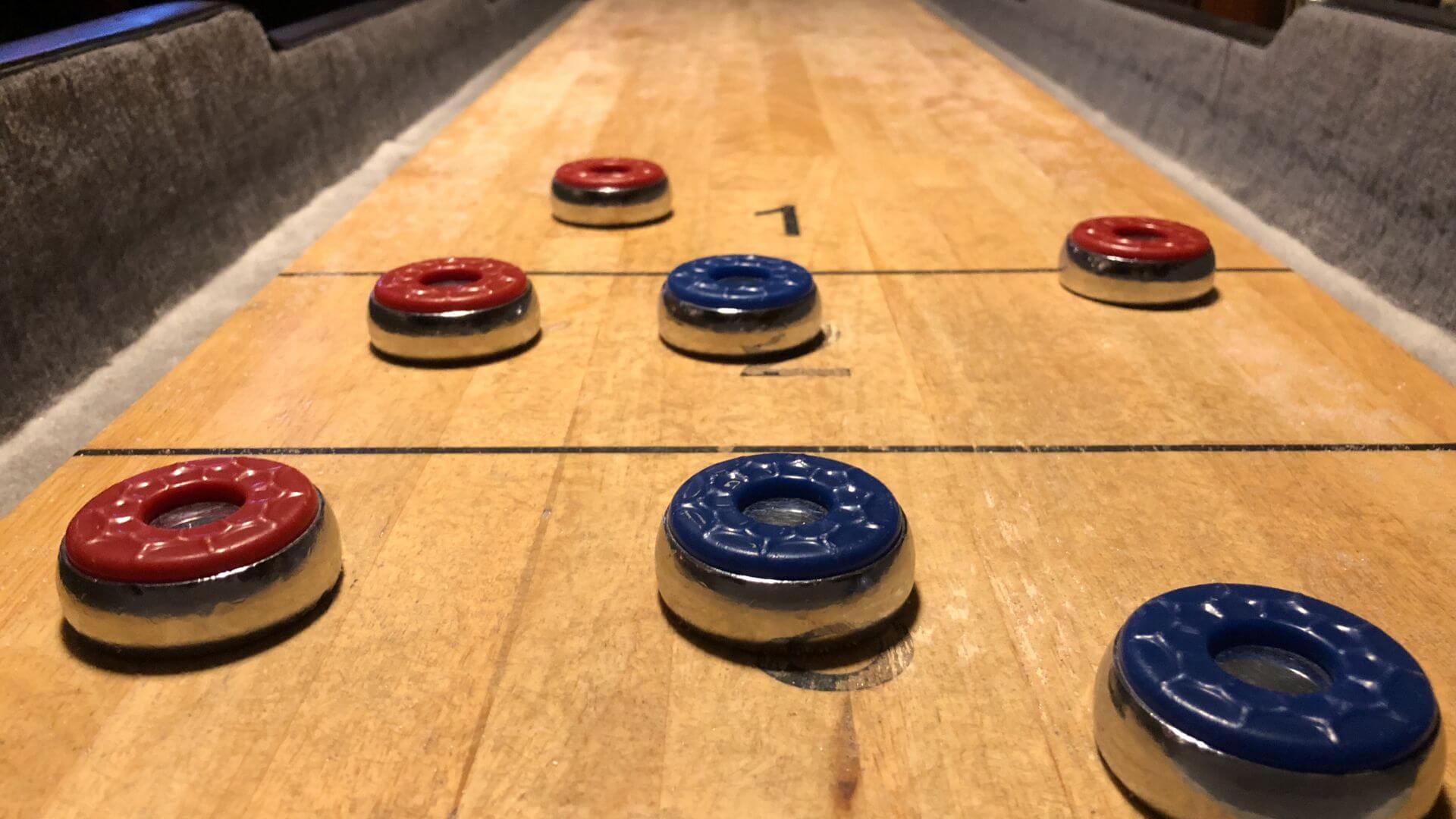 Shuffleboard table in the Boston Bowl game area